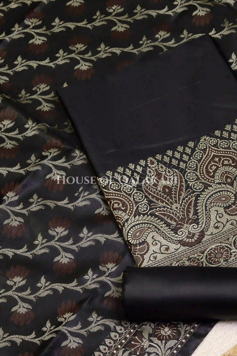 Banarasi Unstitched Dress Material in Black and with plain body and resham border and diagonally striped resham dupatta – product