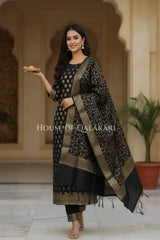 Banarasi Cotton Silk blend Unstitched Dress Material in Black and with matching floral vine jaal dupatta – festive pose