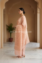 Banarasi Chanderi Cotton Unstitched Dress Material in Peach and with matching floral vine jaal dupatta – side pose