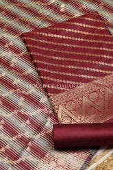 Banarasi Cotton Silk blend Unstitched Dress Material in Maroon Oak and with Bandhani-Leheriya inspired work – product