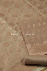 Banarasi Chanderi Cotton Unstitched Dress Material in Champagne beige with intricate Zari Buti work – product
