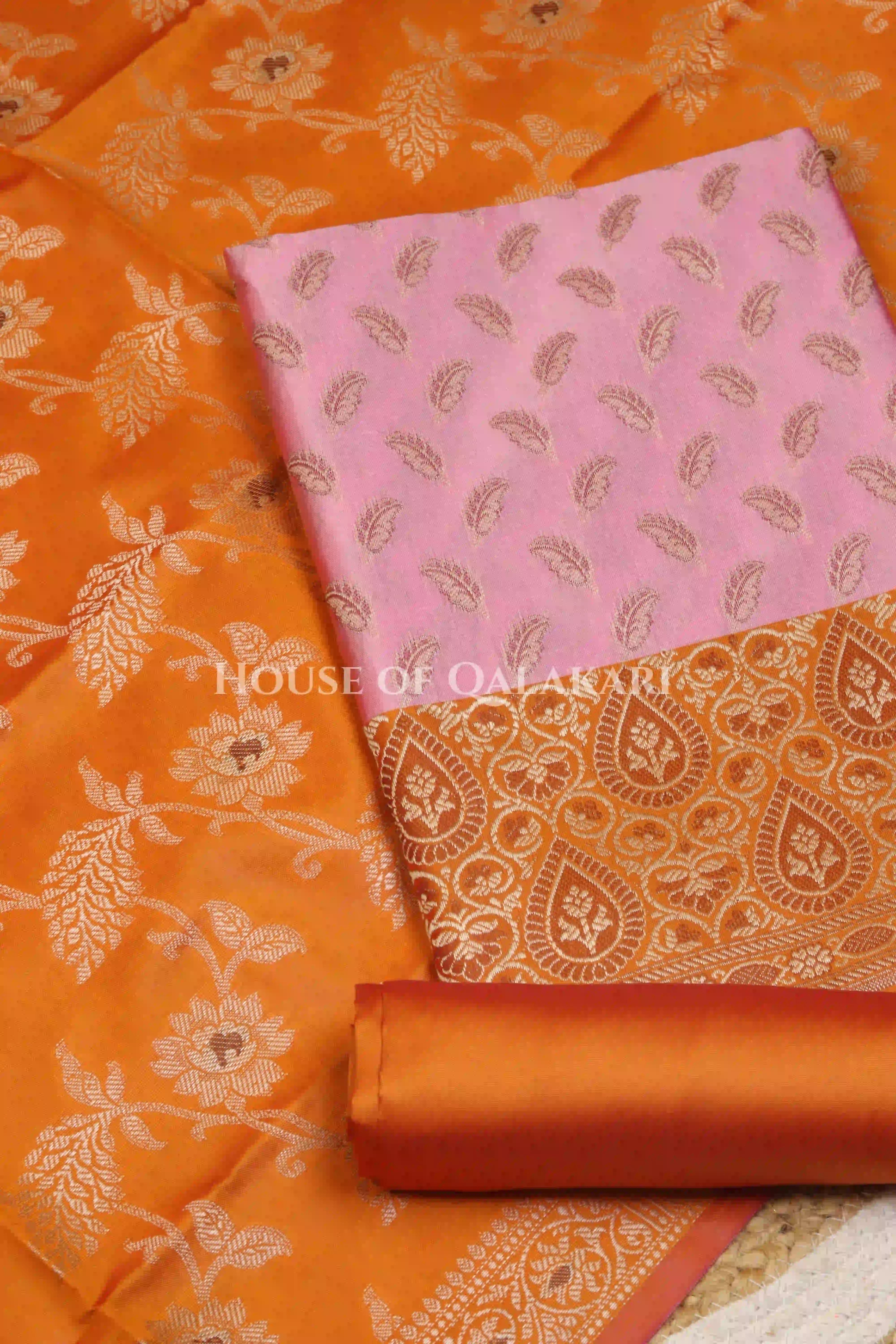 Banarasi Unstitched Dress Material in Dull Pink and with all over leaf buti and resham border along with floral resham jaal dupatta – product