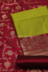 Banarasi silk Unstitched Dress Material in Olive Green and Wine Red contrast with Intricate Zari Buti – product