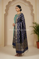 Banarasi Silk in sky blue and navy blue contrast with Intricate Zari Buti – side pose