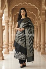 Banarasi silk Unstitched Dress Material in Black and with lotus floral border and diagonal striped zari work dupatta – front pose