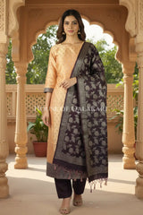 Banarasi Unstitched Dress Material in apricot beige and with all over leaf buti and resham border along with floral resham jaal dupatta – front pose