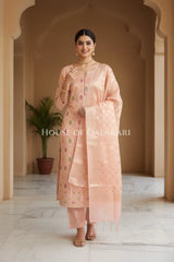 Banarasi Chanderi Cotton Unstitched Dress Material in Peach and with matching floral vine jaal dupatta – festive pose