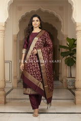 Banarasi Unstitched Dress Material in Velvet Maroon plain kurta and zari border along with floral zari jaal dupatta – front pose