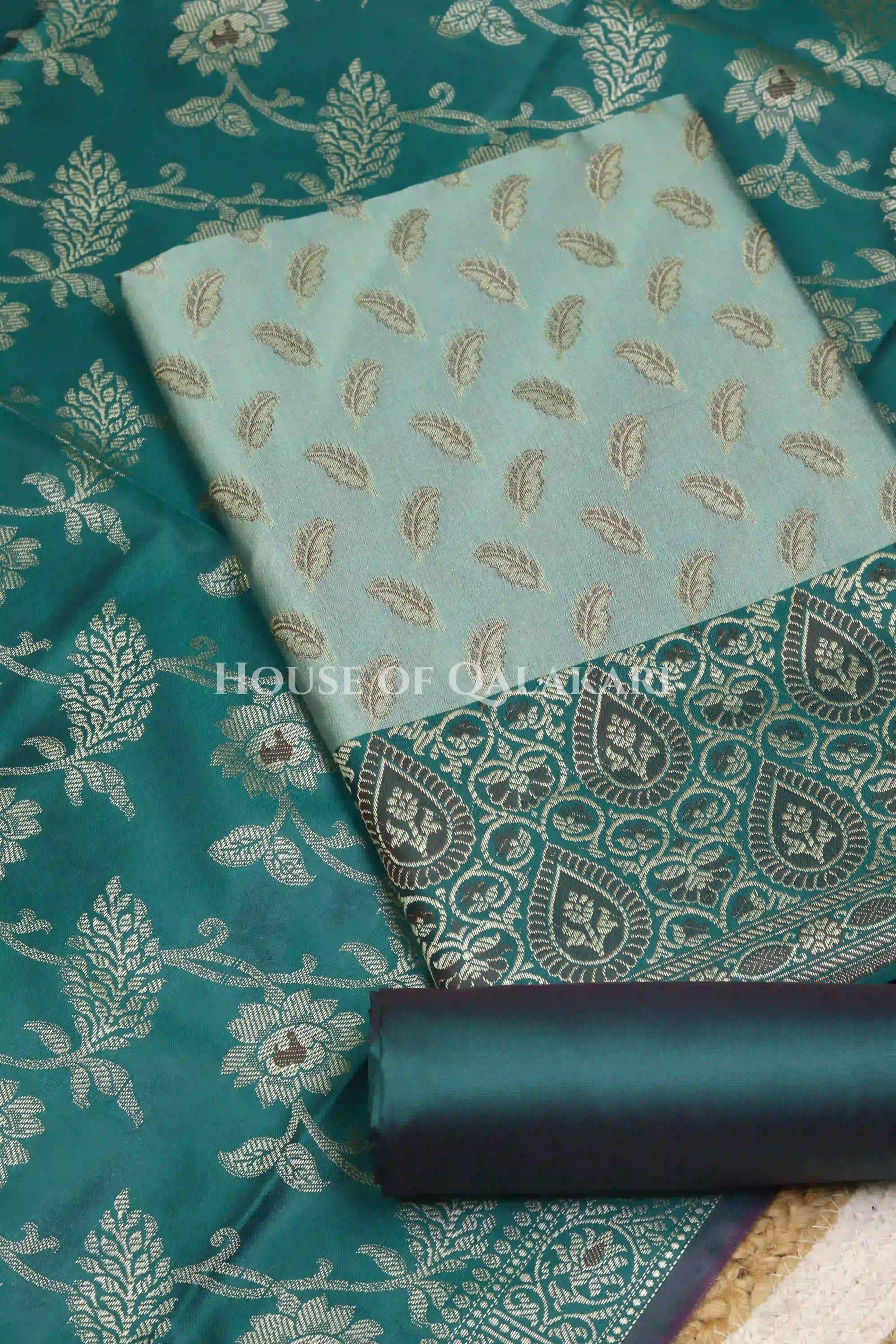 Banarasi Unstitched Dress Material in Silver Green and with all over leaf buti and resham border along with floral resham jaal dupatta – product