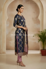 Banarasi Cotton Silk blend Unstitched Dress Material in navy blue and rose gold contrast with Intricate Zari Buti – side pose