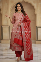 Banarasi Silk Unstitched Dress Material in Rose Pink and Red contrast with Intricate Zari Buti – festive pose