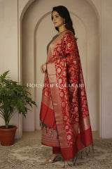Banarasi silk Unstitched Dress Material in grey and red contrast with Intricate Zari Buti – side pose