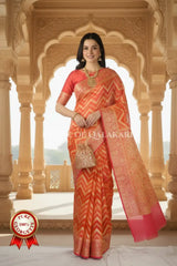 Khaddi Banarasi Saree in Orange tones with zig-zag chevron wave