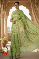 Khaddi Banarasi Saree in light olive green with all over floral jaal butis