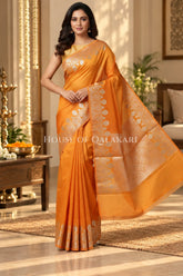 Banarasi Raw Mango Silk Saree in Orange with Plain Body & Floral Zari Border & Pallu