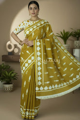 Mustard Bagru Mulmul cotton Saree with Off-White Prints