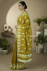 Mustard Bagru Mulmul cotton Saree with Off-White Prints
