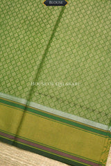 Mehndi Green Banarasi Mulmul cotton patola Saree with Chevron Check Floral Buti & contrast Yellow Gold Border