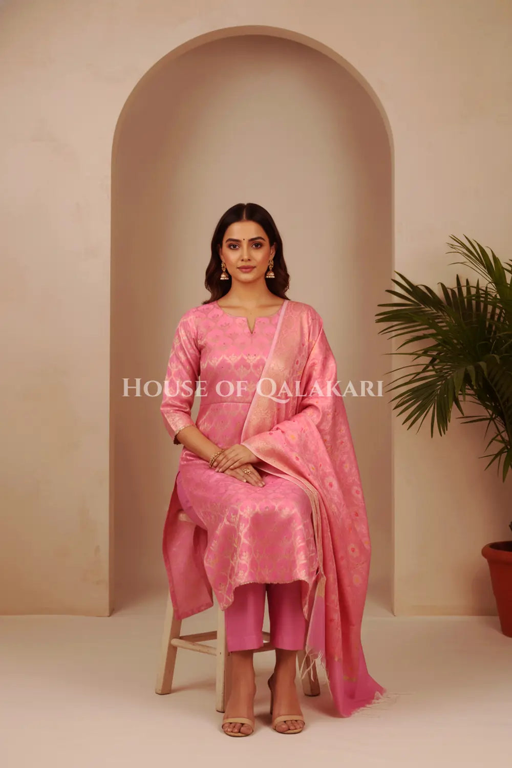 Pink Banarasi Chanderi Cotton Unstitched Dress Material with Zari Work – sitting pose