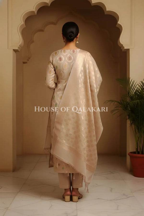 Banarasi Chanderi Cotton Unstitched Dress Material in Rose Gold and with matching floral vine jaal dupatta – back pose
