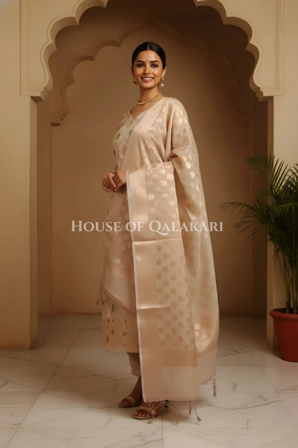 Banarasi Chanderi Cotton Unstitched Dress Material in Rose Gold and with matching floral vine jaal dupatta – side pose