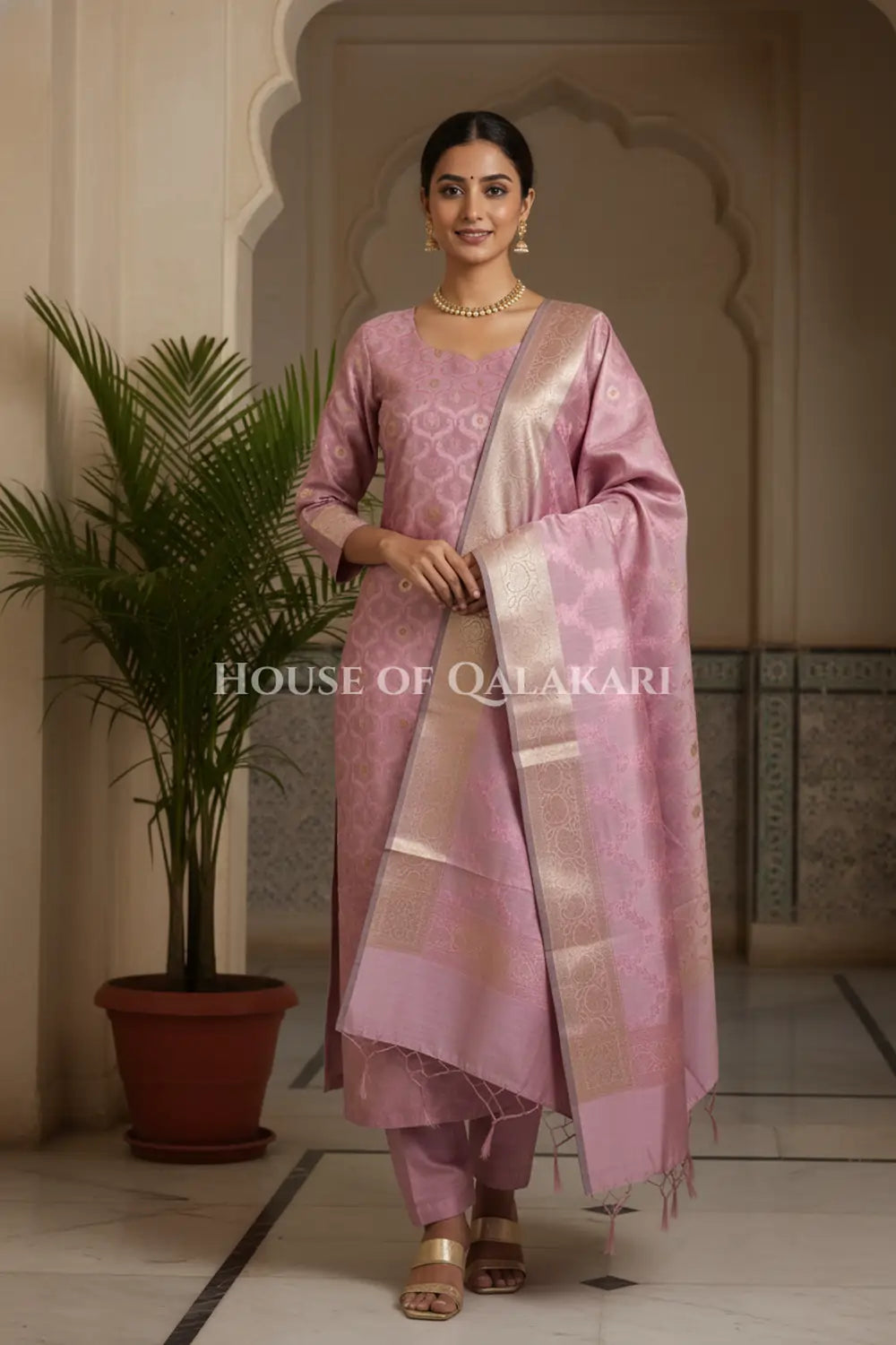 Banarasi Chanderi Cotton Unstitched Dress Material in Light Mauve and with matching floral vine jaal dupatta – festive pose