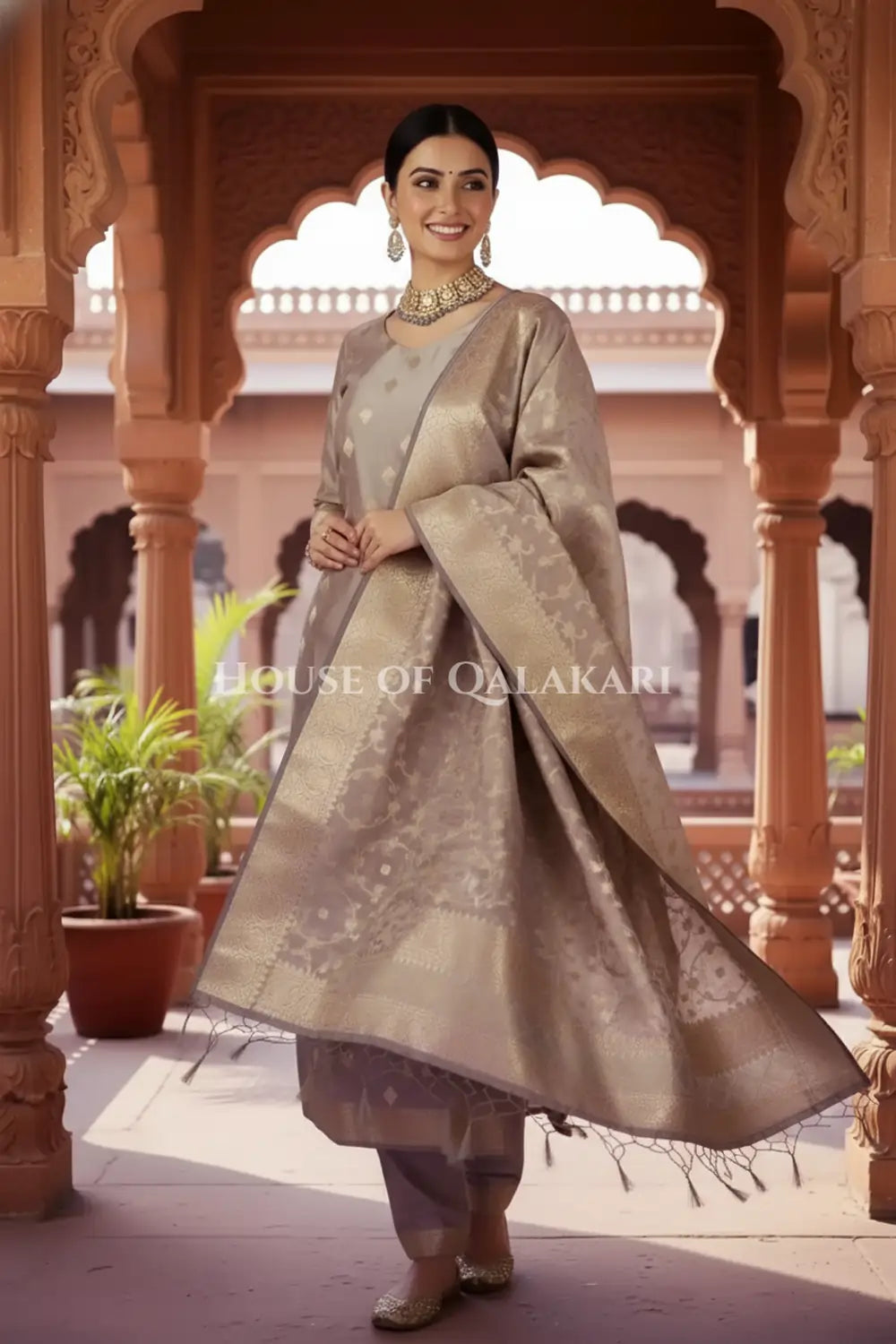 Banarasi Cotton Silk blend Unstitched Dress Material in Antique Grey colour with Intricate Zari Diamond Buti – festive pose
