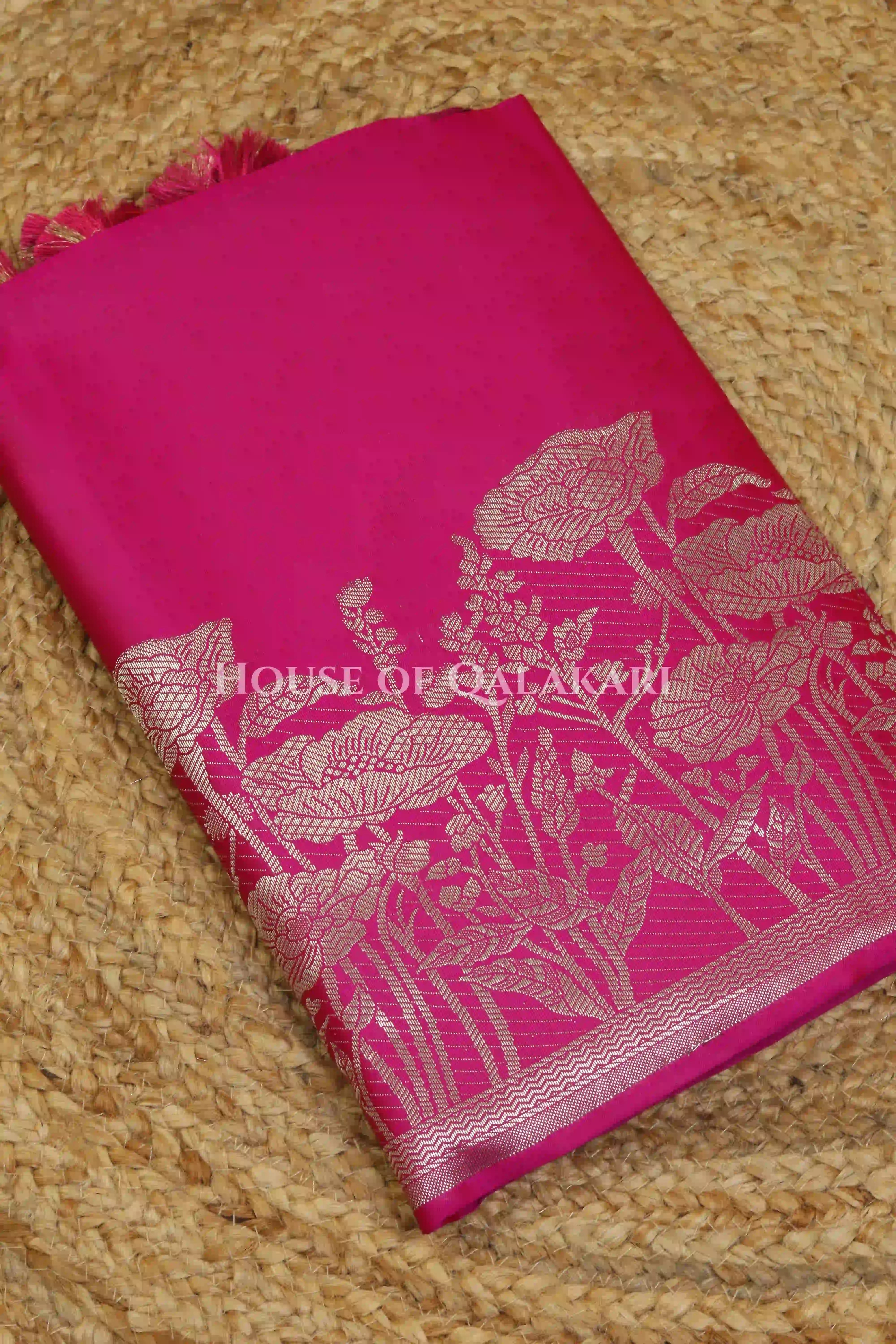 Banarasi silk Unstitched Dress Material in Rani Pink and with lotus floral border and diagonal striped zari work dupatta – kurta