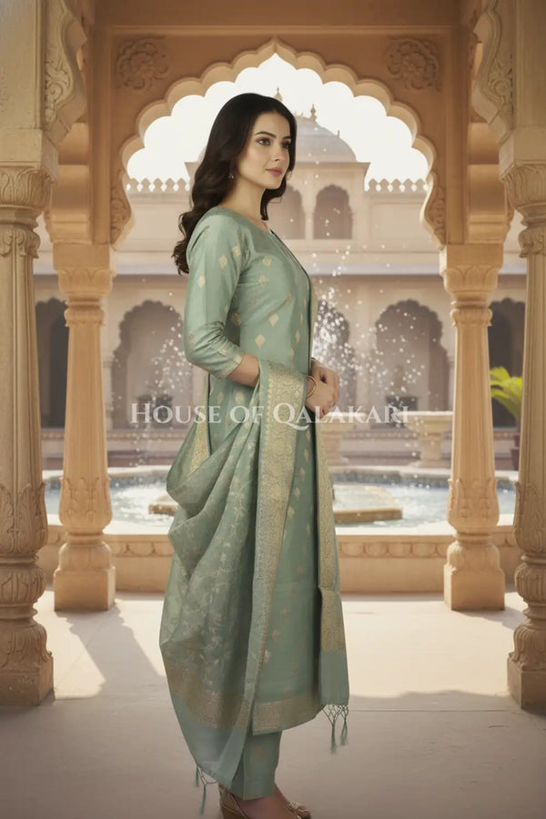 Banarasi Cotton Silk blend Unstitched Dress Material in Antique Aqua green colour with Intricate Zari Diamond Buti – side pose