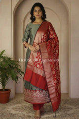 Banarasi silk Unstitched Dress Material in grey and red contrast with Intricate Zari Buti – front pose