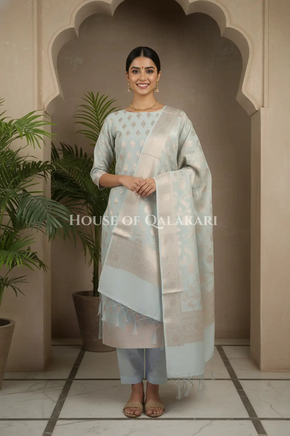 Banarasi Chanderi Cotton Unstitched Dress Material in Ash Grey with intricate Zari Buti work – festive pose