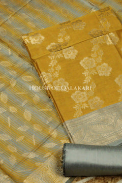 Banarasi Cotton Silk blend Unstitched Dress Material in mustard and silver grey contrast with Intricate Zari Buti – product