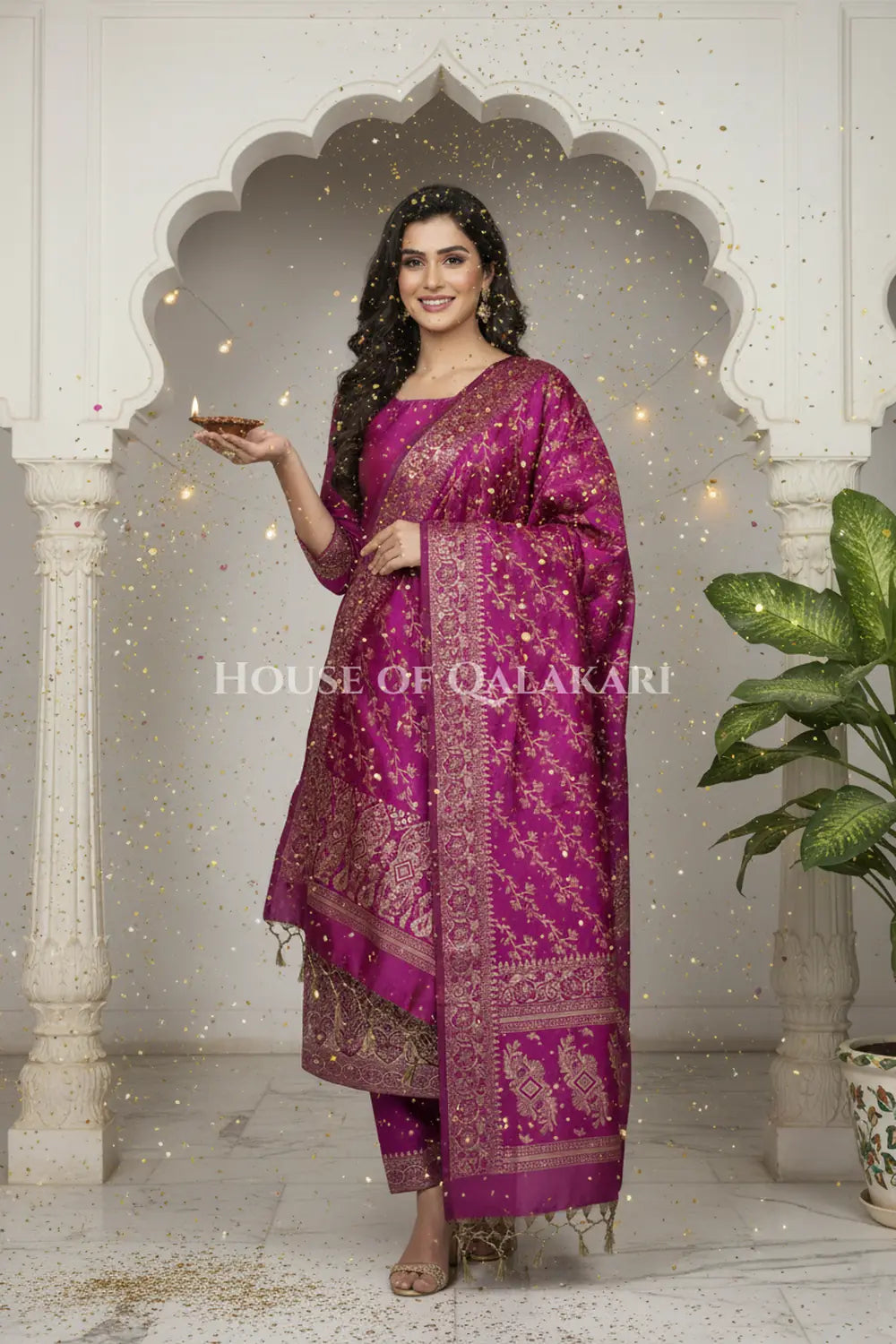 Banarasi Unstitched Dress Material in Rich Purple and with plain body and resham border and diagonally striped resham dupatta – festive pose