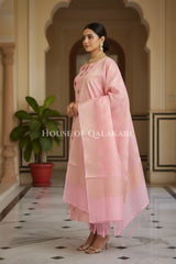 Banarasi Chanderi Cotton Unstitched Dress Material in Baby Pink and with matching zari floral jaal dupatta – side pose