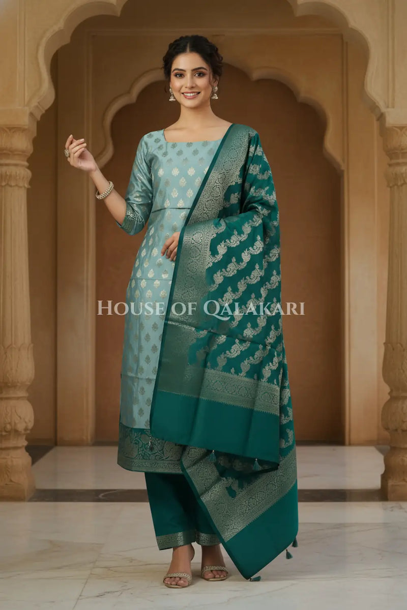 Banarasi Silk Unstitched Dress Material in Blue Grey and Deep Bluish Green contrast with Intricate Zari Buti – festive pose