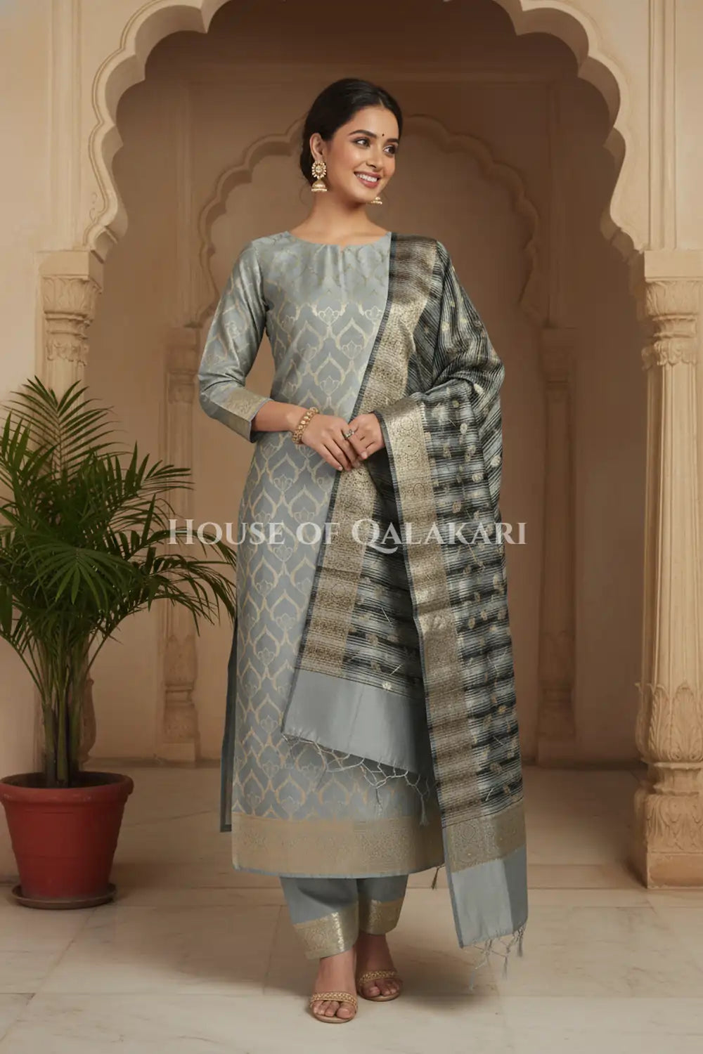 Banarasi Cotton Silk blend Unstitched Dress Material in Grey and with contrast Black-Grey striped dupatta – festive pose