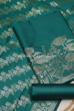 Banarasi silk Unstitched Dress Material in Emerald Green and with lotus floral border and diagonal striped zari work dupatta – product