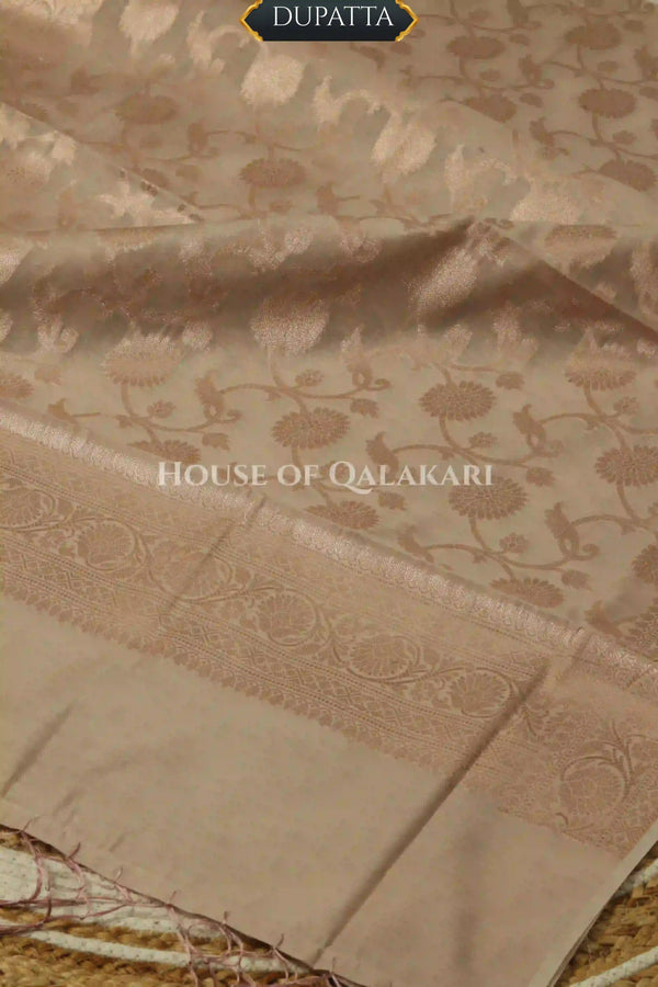 Banarasi Chanderi Cotton Unstitched Dress Material in Champagne beige with intricate Zari Buti work – dupatta