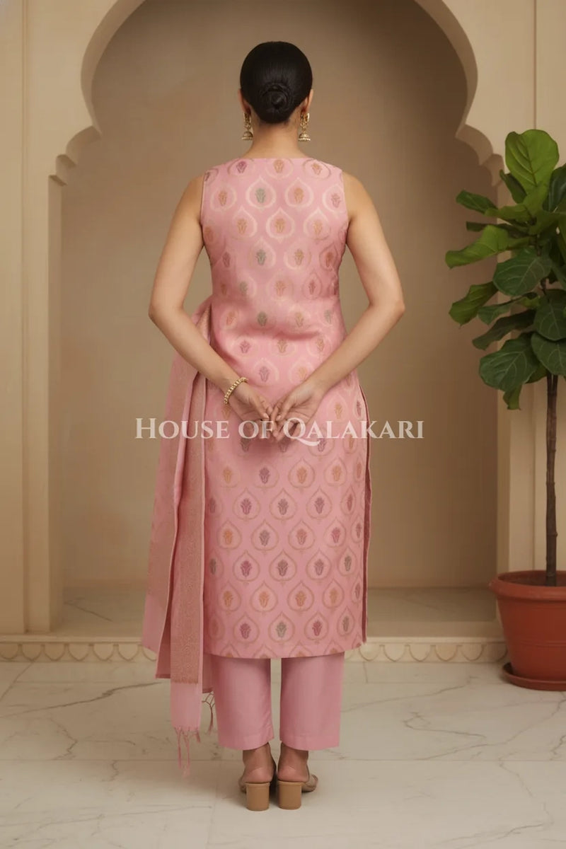 Pastel pink Banarasi Chanderi Cotton Unstitched Dress Material with Zari Work – back pose