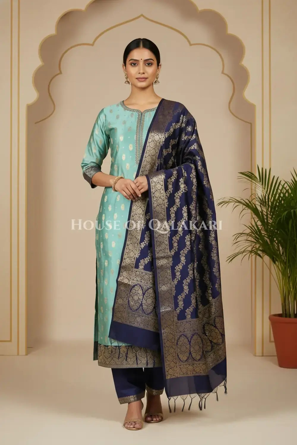 Banarasi Silk in sky blue and navy blue contrast with Intricate Zari Buti – front pose