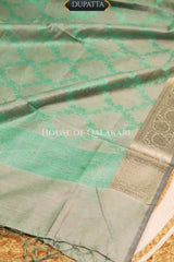 Banarasi Unstitched Dress Material in Grey Olive -Sea Green diamond Chokdi resham work kurta and zari border – dupatta