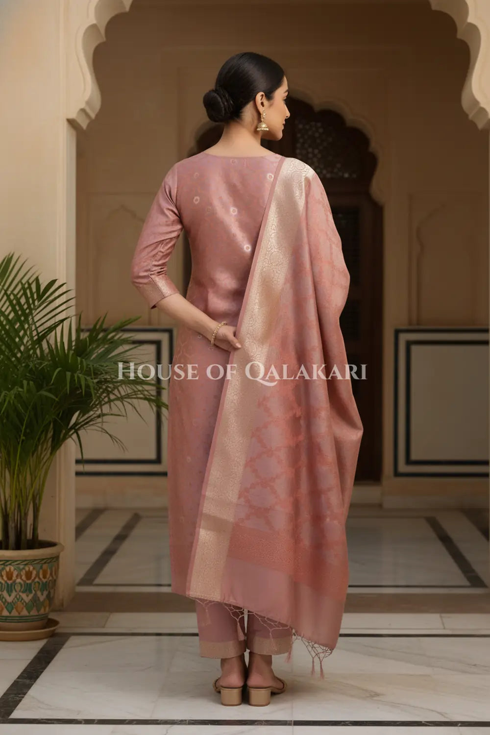 Banarasi Chanderi Cotton Unstitched Dress Material in Copper rose and with matching floral vine jaal dupatta – back pose