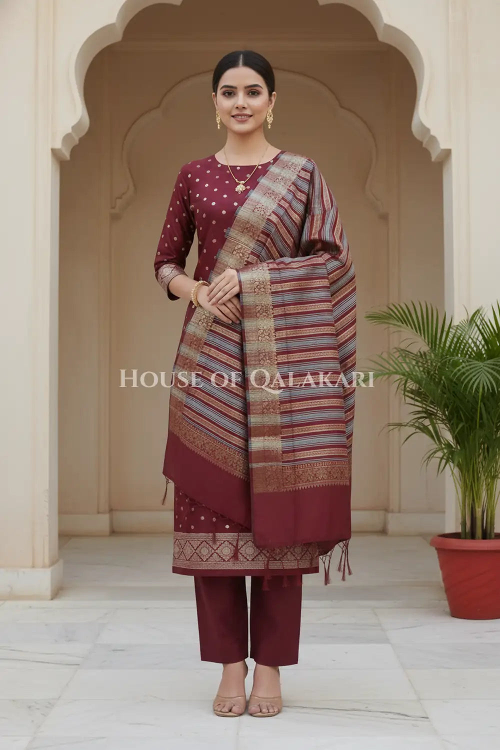 Banarasi Cotton Silk blend Unstitched Dress Material in Maroon Oak and with gol buti( Polka dots) inspired work – wedding pose