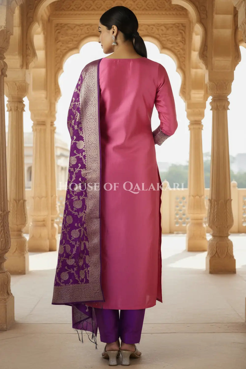 Banarasi silk Unstitched Dress Material in Rose Pink and Dark Purple contrast with Intricate Zari Buti – back pose