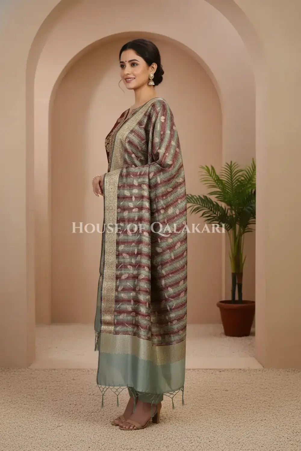 Banarasi Cotton Silk blend Unstitched Dress Material in maroon and Grey contrast with Intricate Zari Buti – side pose