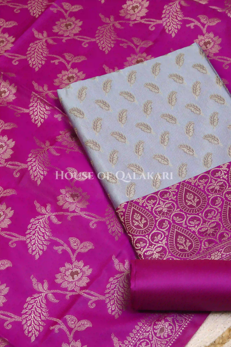 Banarasi Unstitched Dress Material in Light Blue and with all over leaf buti and resham border along with floral resham jaal dupatta – product