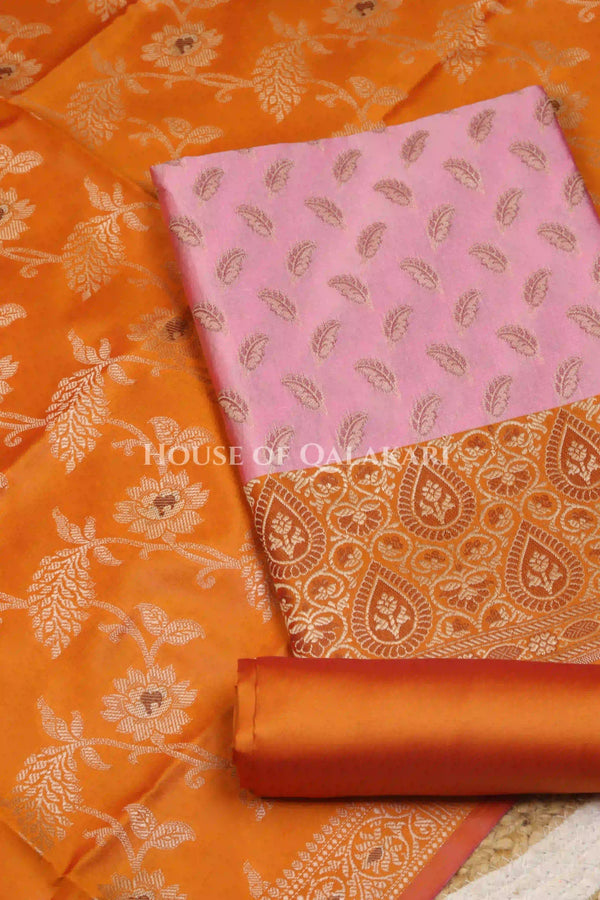 Banarasi Unstitched Dress Material in Dull Pink and with all over leaf buti and resham border along with floral resham jaal dupatta – product