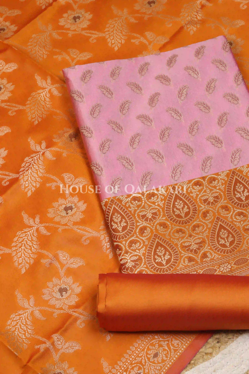 Banarasi Unstitched Dress Material in Dull Pink and with all over leaf buti and resham border along with floral resham jaal dupatta – product