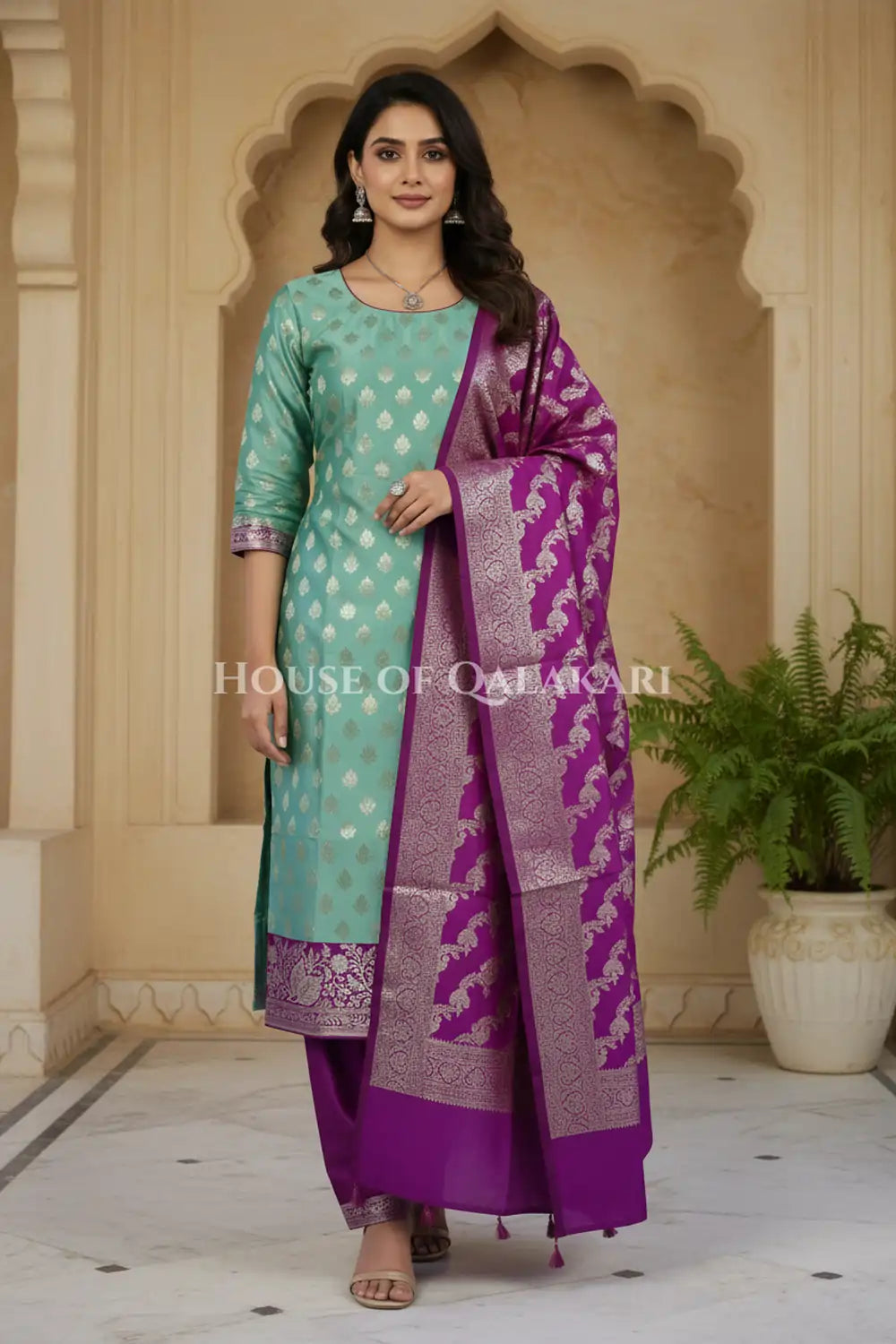 Banarasi Silk Unstitched Dress Material in Light Teal Green and Rich Purple contrast with Intricate Zari Buti – front pose
