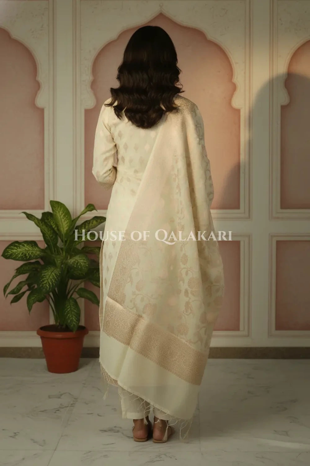 Banarasi Chanderi Cotton Unstitched Dress Material in Cream with intricate Zari Buti work – back pose
